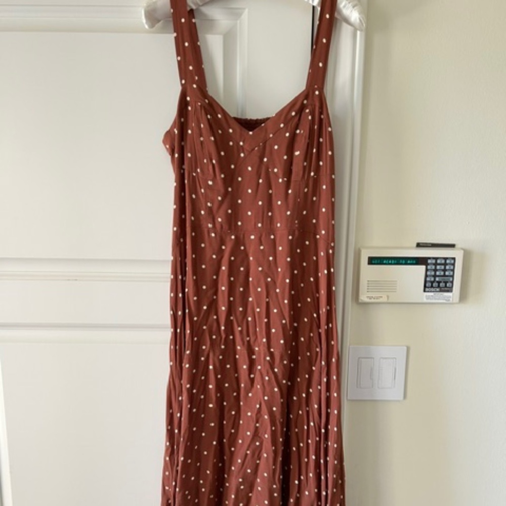 Polka Dot dress that has a jagged bottom